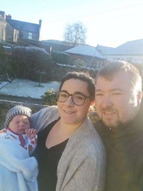 Linzi and Stuart Davidson with Christmas baby Braxton at home in Rothes.