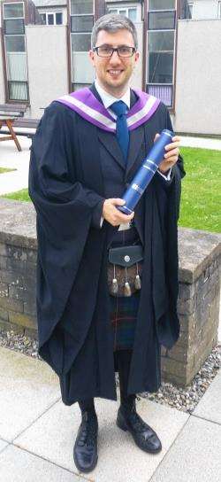 Councillor Gary Coull with his BA in History and Politics.