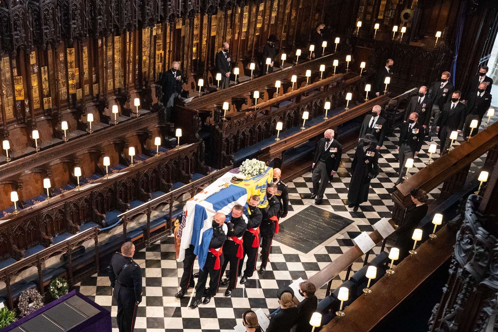 Pallbearers carry the coffin of the Duke of Edinburgh during his funeral at St George’s Chapel, Windsor Castle, Berkshire (Dominic Lipinski/PA)