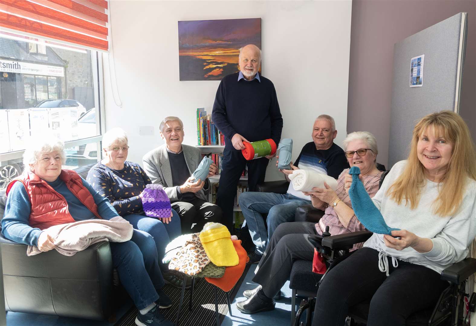 Displaying some of the types of items to be funded by the grant are (from left) Linda McDonald, Annabelle McLean, David Thompson (Moray Firth Credit Union) BAF chairman Gordon McDonald, Kevin McKay, Ailsa Foulds and Dee Hamilton. Picture: Beth Taylor