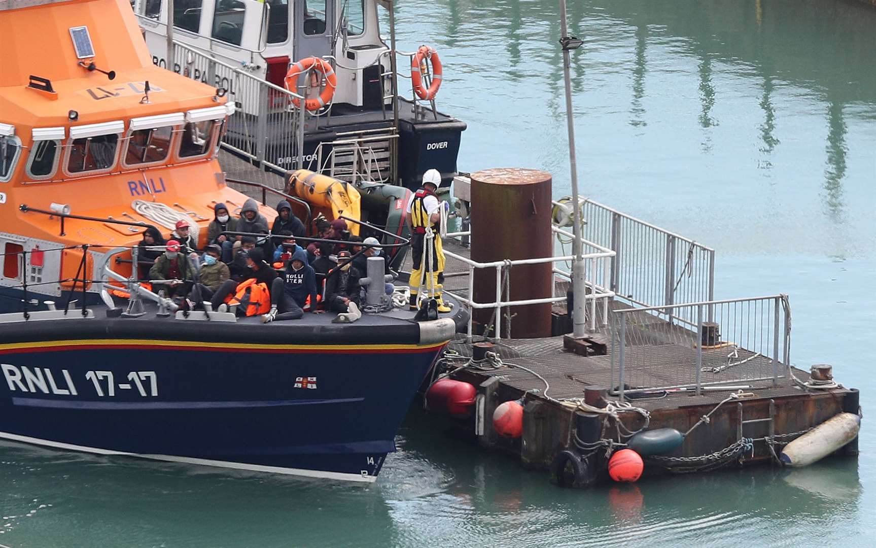 A group of people thought to be migrants are brought in to Dover by the RNLI (Andrew Matthews/PA)