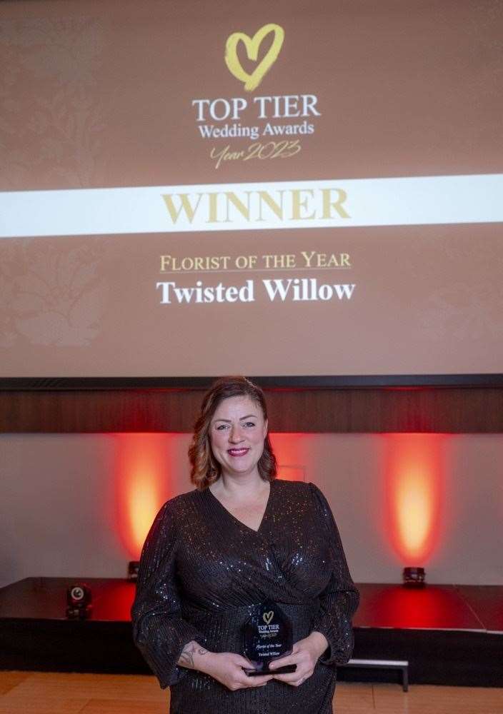 Caroline Holmes from Twisted Willow Florists with her second trophy in three years. Picture: @aberdeenphoto.com