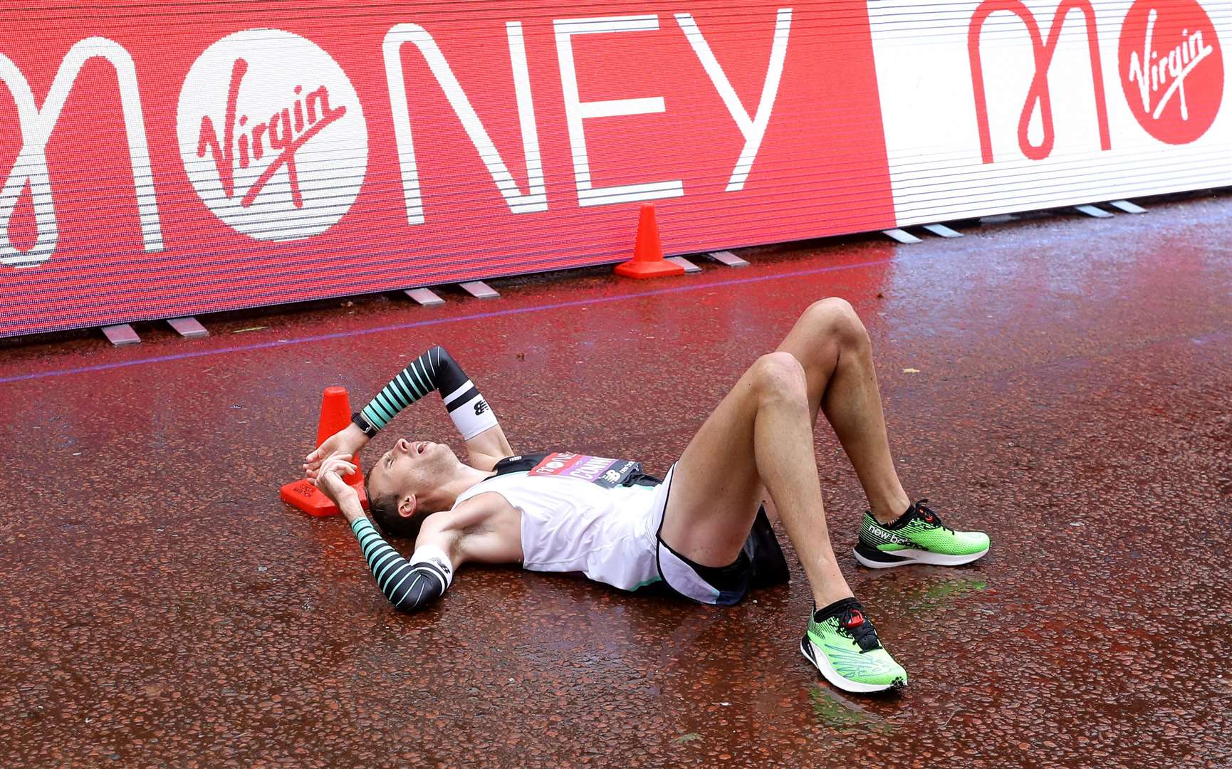 He was ready for a rest at the finish line (Richard Heathcoate/PA)