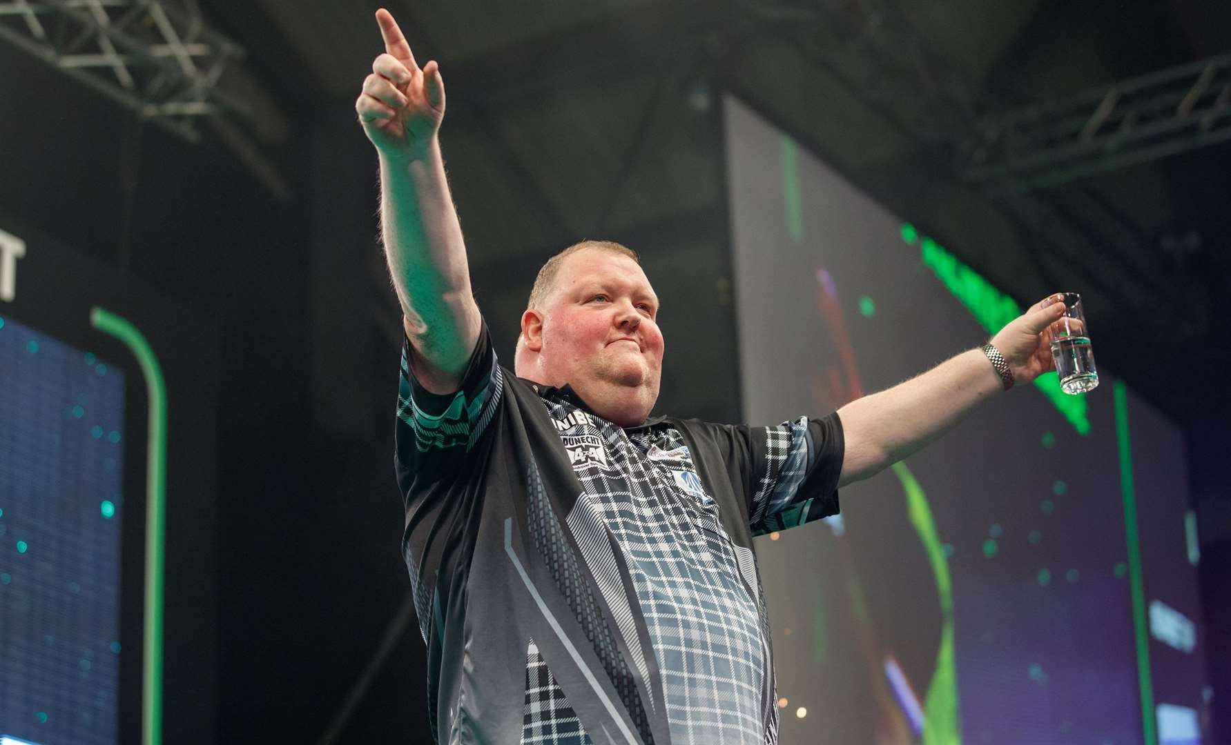 Huntly darts favourite John Henderson is on the march in the PDC world championships.