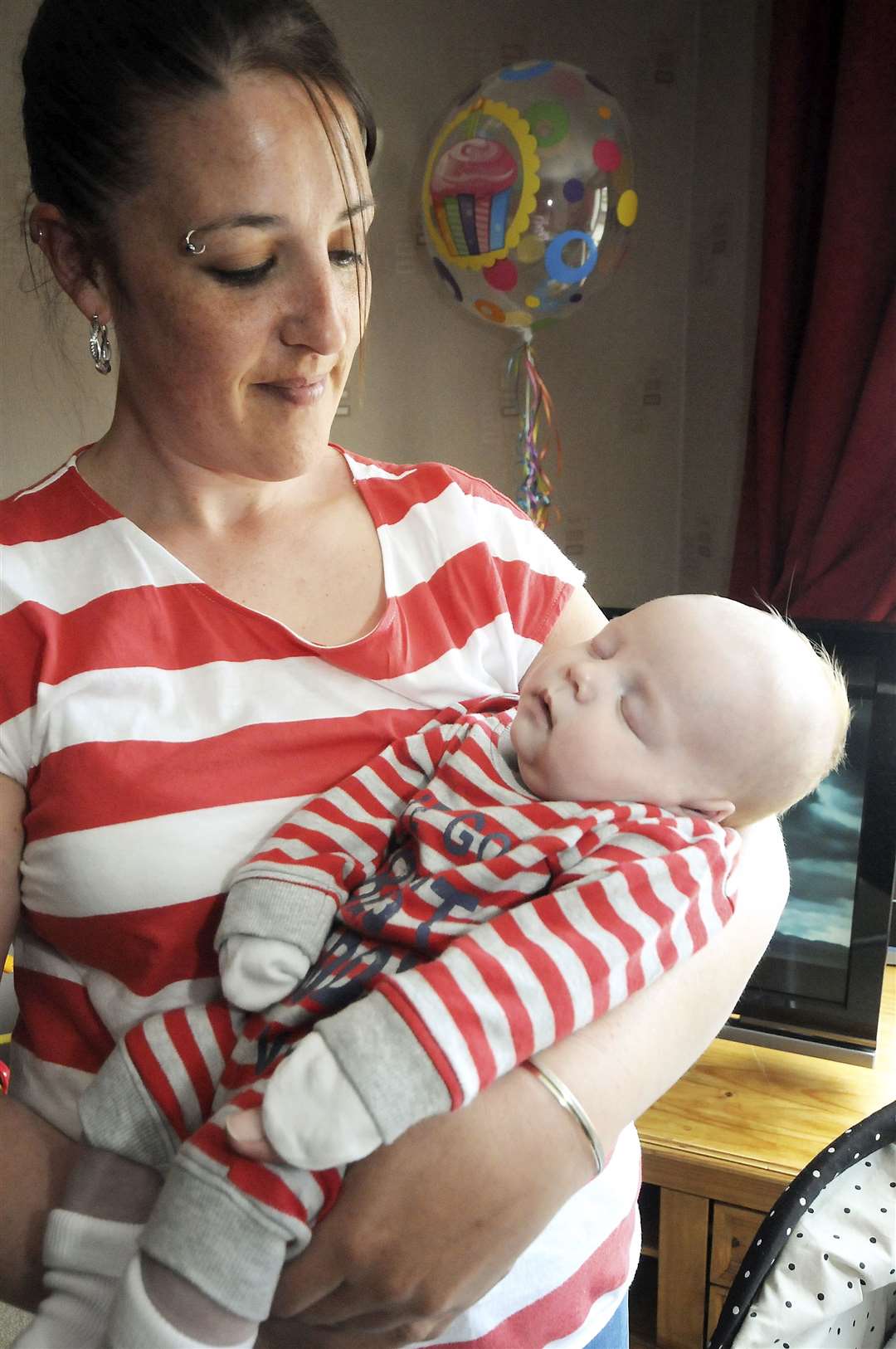 Cody French, in the arms of mother Lisa, healthy and well at 10 weeks old...Picture: Becky Saunderson