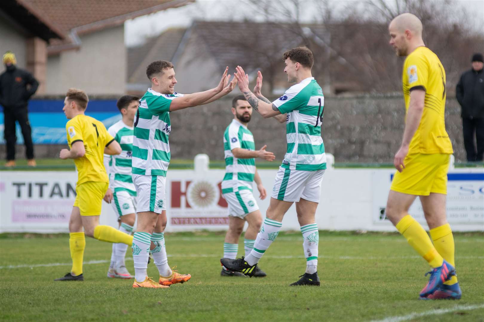 Buckie Thistle's Joe McCabe (right) celebrates opening the scoring against Clachnacuddin FC with teammate Scott Adams...Picture: Daniel Forsyth..
