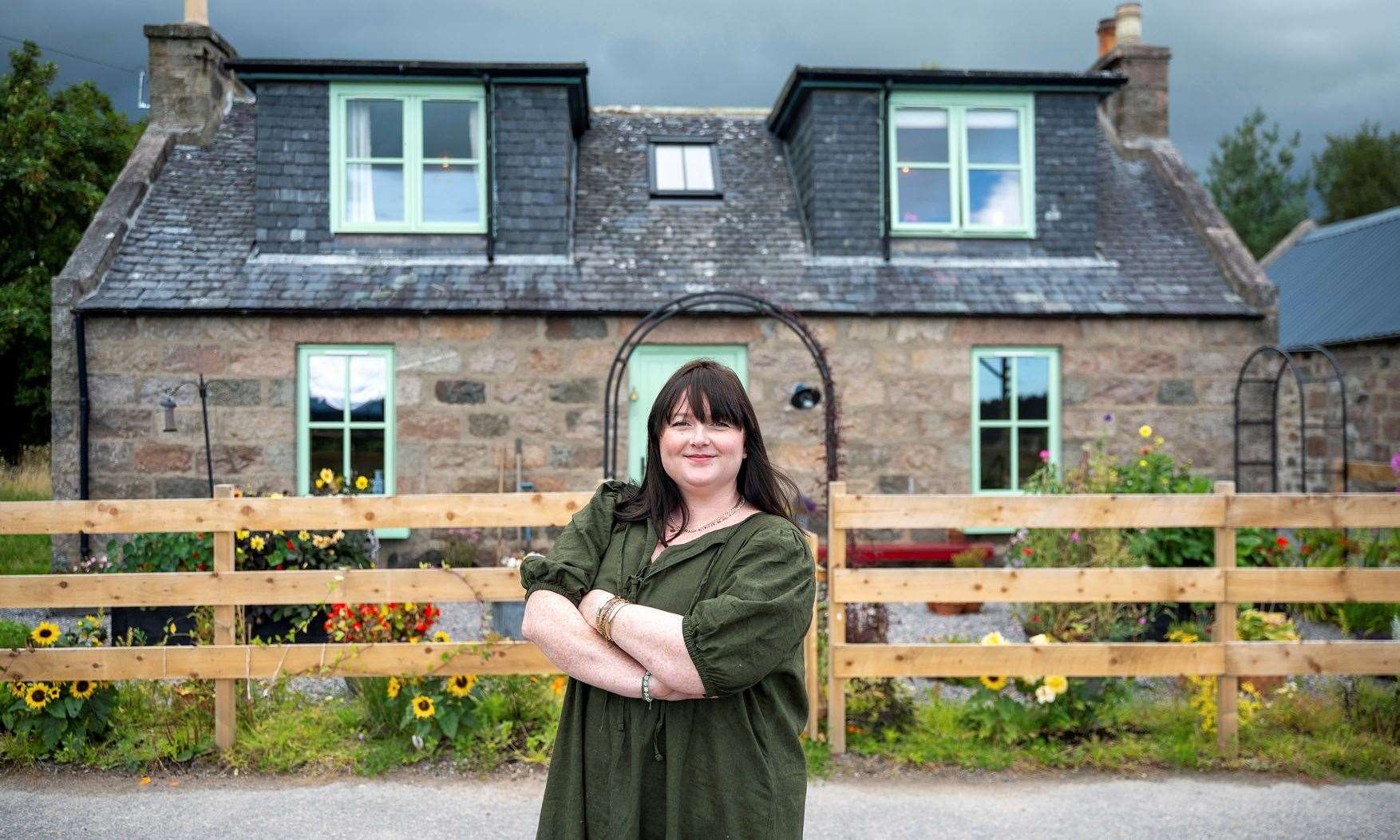 Homeowner Rachel outside Quiney Cottage, Banchory. ,Quiney Cottage is a traditional farmhouse cottage, dating back to the 1860s. Home to Rachel and her cat Drizzy, the home is a postcard-perfect Scottish cottage bursting with personality.. Picture: IWC Media,Michael Traill
