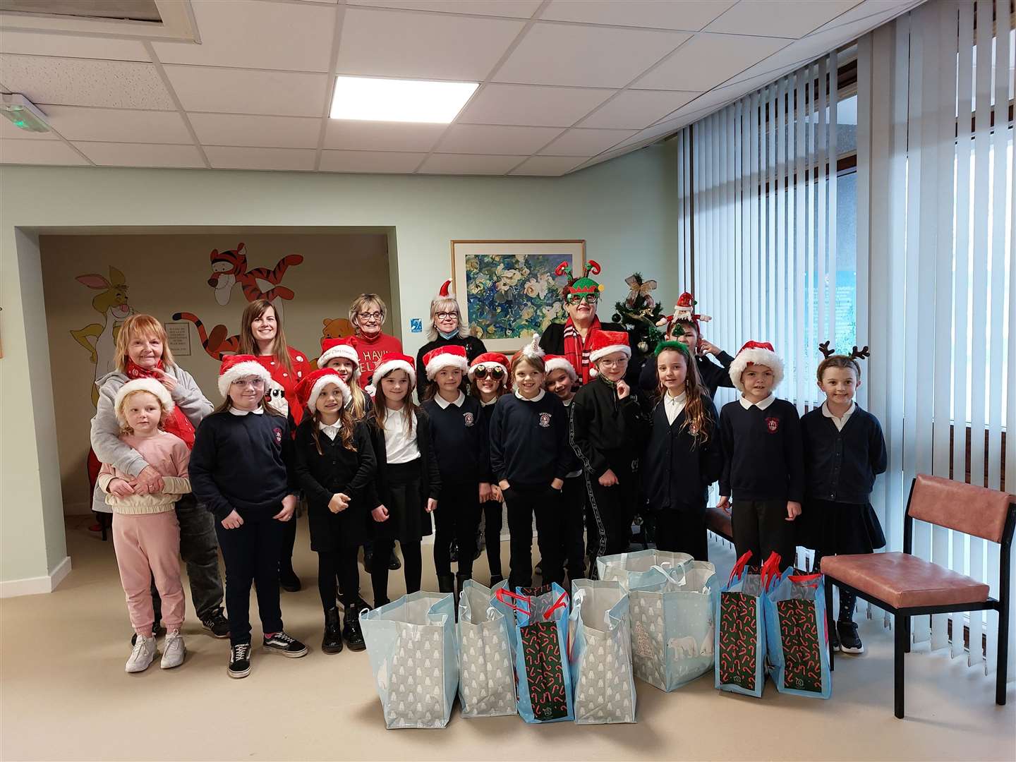 Portessie Primary pupils get ready to join Friends volunteers in spreading some festive joy at Seafield Hospital and Muirton Ward. Picture: Friends of Seafield