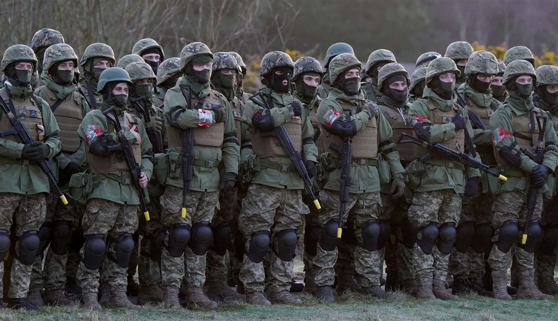 Ukrainian troops and their UK military instructors (Gareth Fuller/PA)