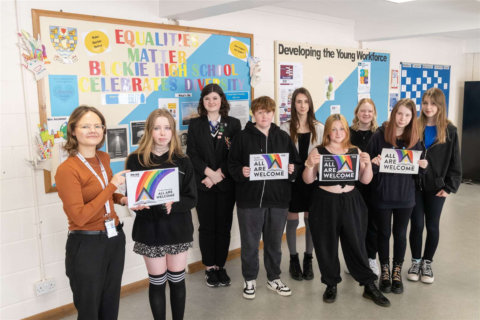 Alice Leitch (left) with Shayla Miller and other members of Buckie High School LGBTQ+ Pride Group show off their Pride Month poster. Picture: Beth Taylor