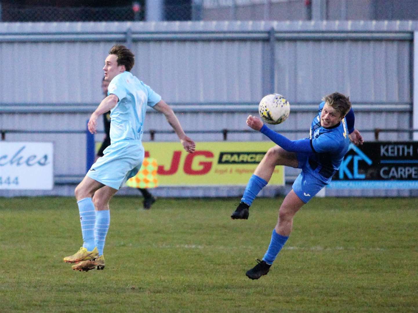 Joe Cuthbert clears the ball away from Keith's Gavin Elphinstone. Picture: Frances Porter