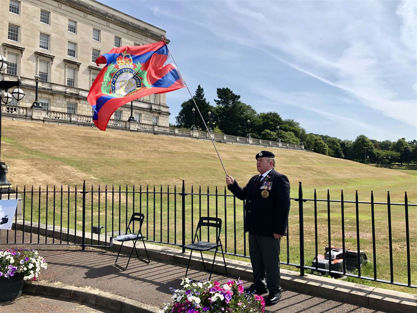 Robert Donaldson from Enniskillen, who served with the police and Army during the Troubles, joins the protest at Stormont (David Young/PA)