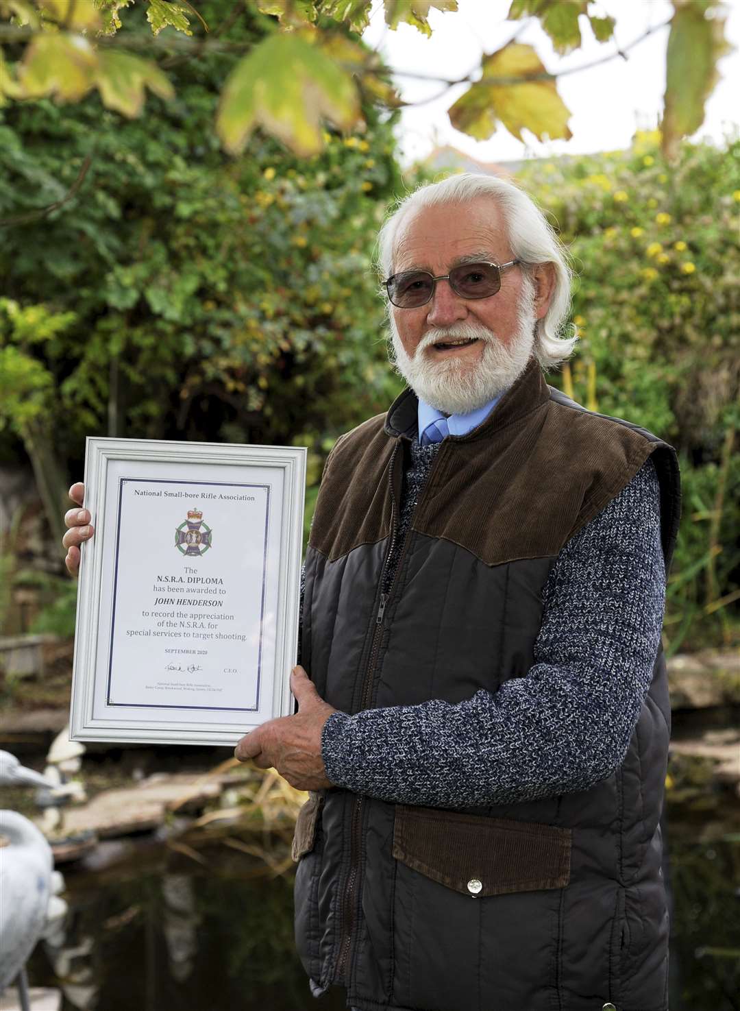 Picture: Eric Cormack. . Jack Henderson from huntly awarded a certificate for his services to the national smalll-bore rifle association..