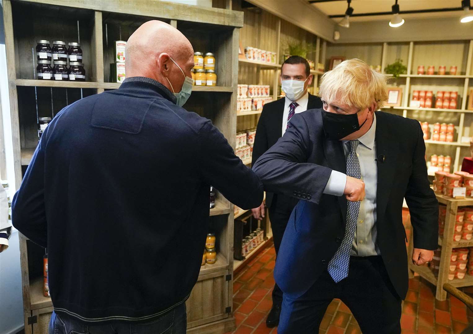 Boris Johnson doing the elbow greeting during his visit to Baxters Factory. Picture by Andrew Parsons