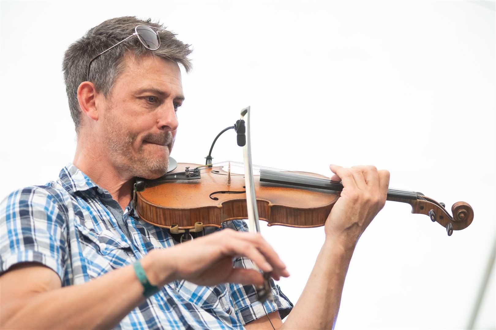 Colin Campbell performs with James Alexander's fiddle on Sunday.Picture: Daniel Forsyth