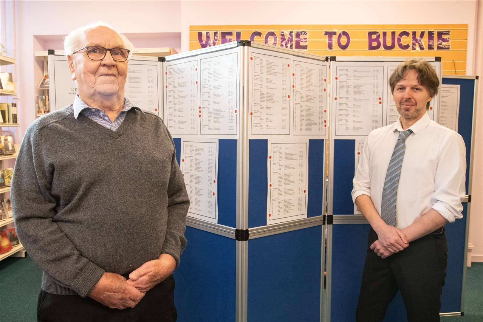 Local historian David Fowler (left) and senior library assistant Richard Fletcher admire the remembrance display. Picture: Daniel Forsyth