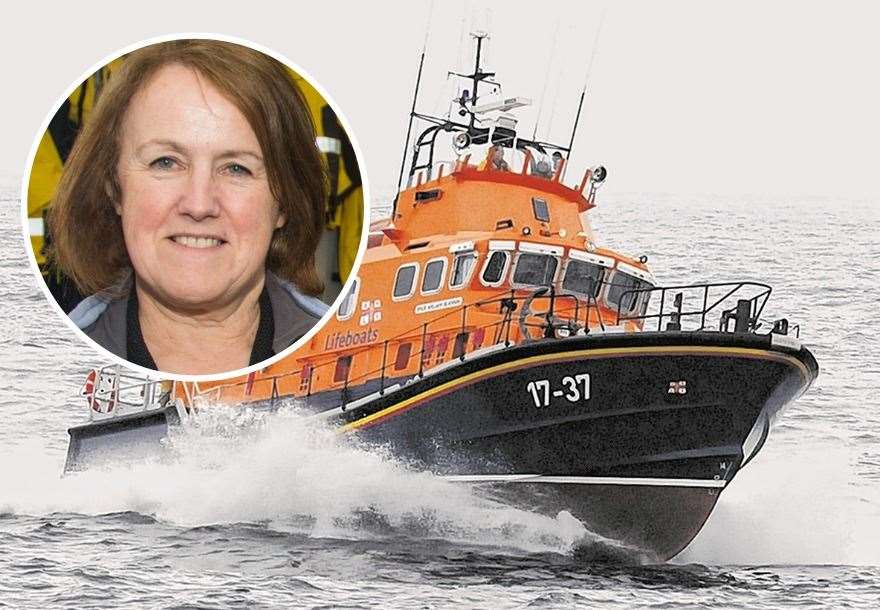 The volunteer crew of Buckie's RNLI lifeboat William Blannin have recorded a seasonal message of goodwill. Inset: Buckie RNLI lifeboat operations manager Anne Scott.