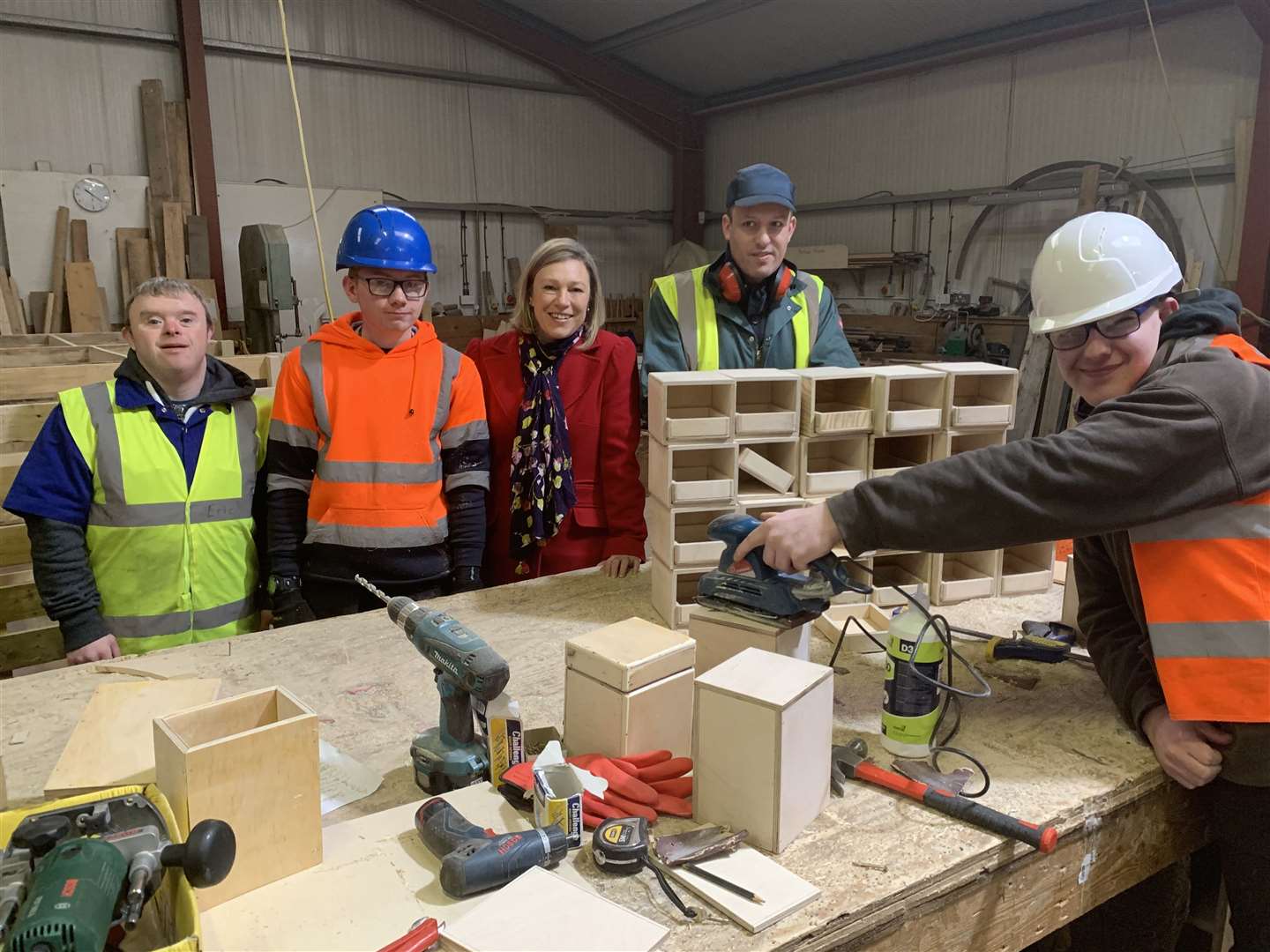 Wood RecyclAbility's Neil Buchan, Kieran Thompson, Andrew Bremner and Liam McGee with MSP Gillian Martin.