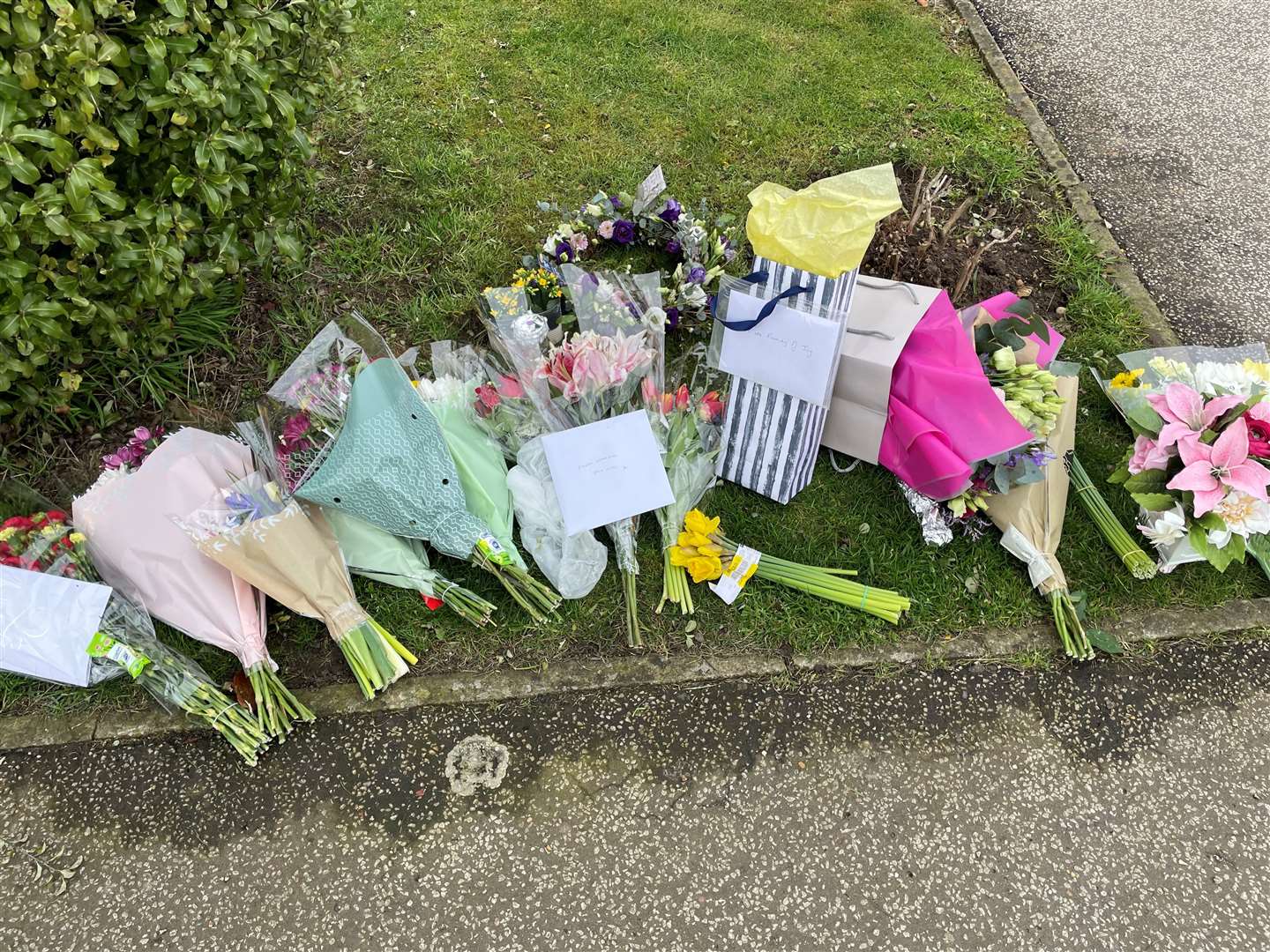 Flowers left outside the scene of the crime (Sam Russell/PA)