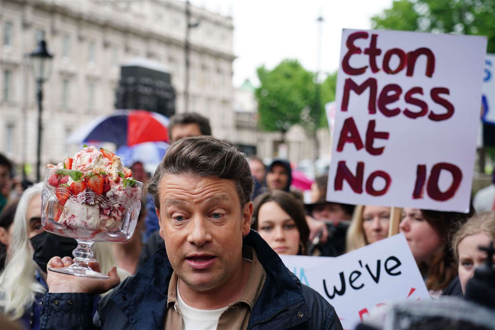 Chef Jamie Oliver takes part in the What An Eton Mess demonstration outside Downing Street (Dominic Lipinski/PA)