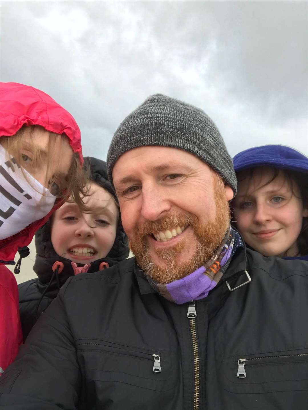 Neil Bremner with his wife and two daughters.