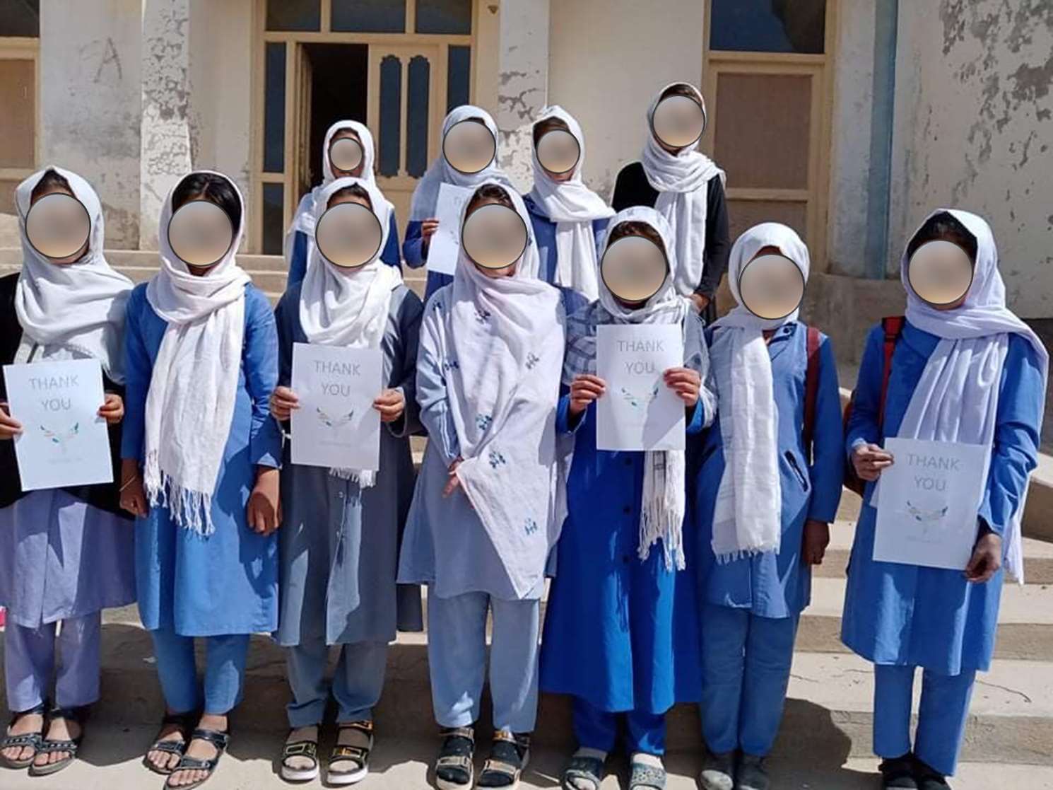 Girls being supported through Buddy Box in Afghanistan – their faces have been blurred to protect their identity (Medhi Nazari/PA)
