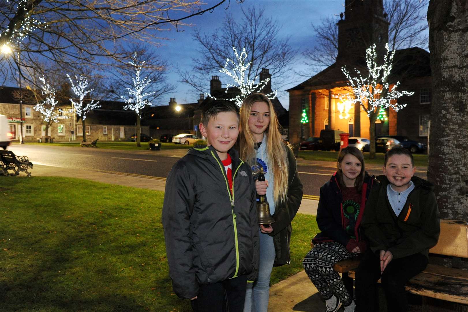 Fochabers gala VIPs (from left) Tavis Thomson, Lottie Du Pon, Nicole Smith and Connal McGeoch switch on the Fochabers Christmas lights back in 2019. Picture: Eric Cormack