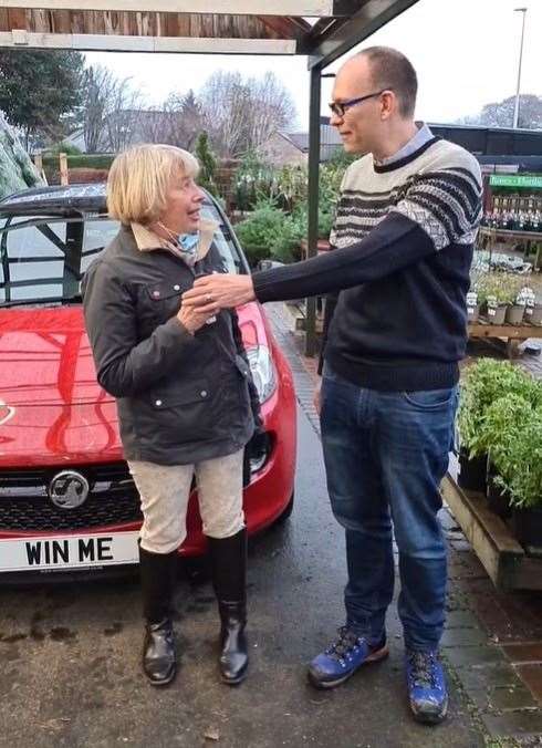 Derek Adam, from Kemnay, hands over the keys for his new car to his mum, Marjory Adam, from Fochabers.