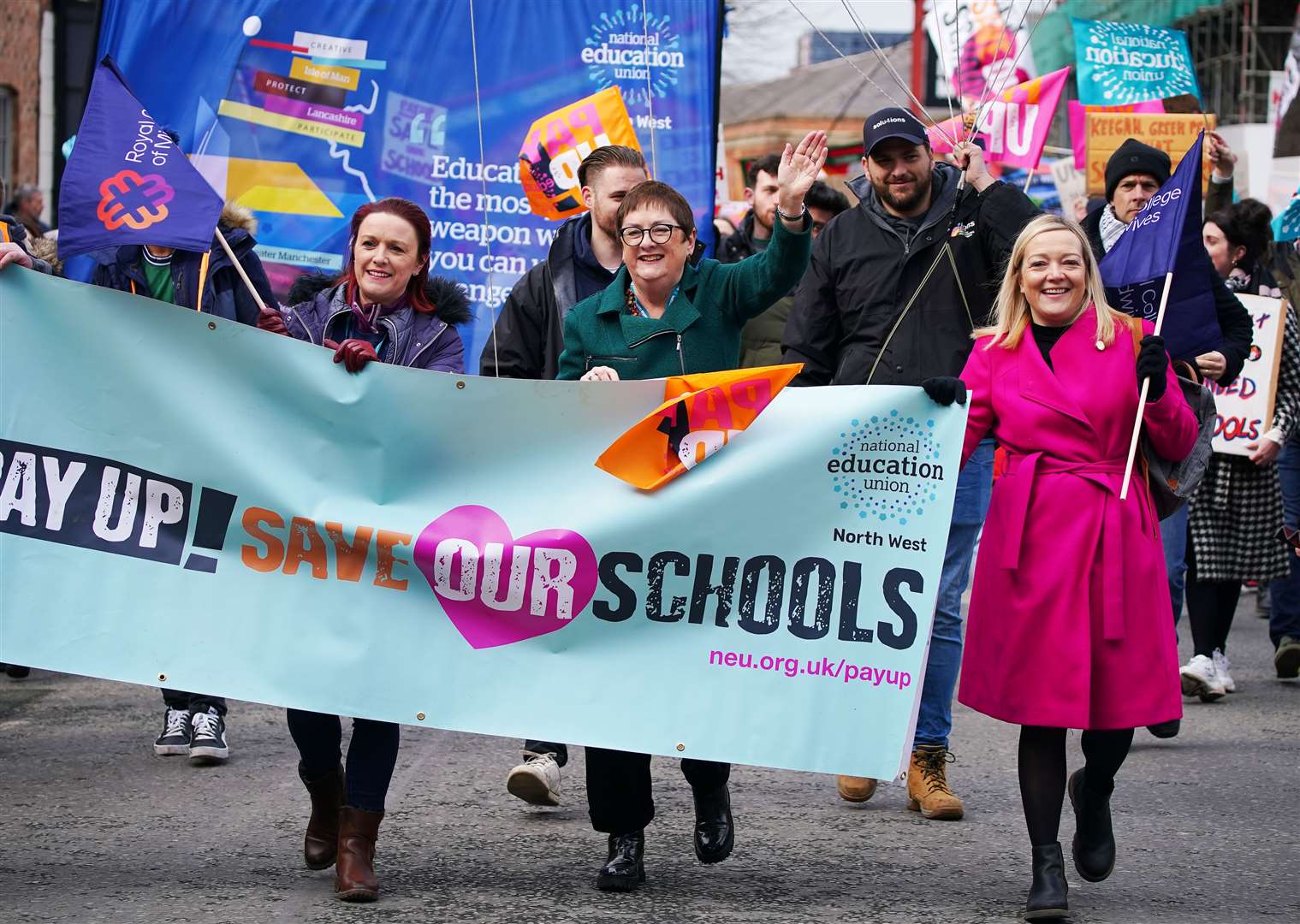 National Education Union co-leader Mary Bousted (centre) with members at a rally in central Manchester in February (Peter Byrne/PA)