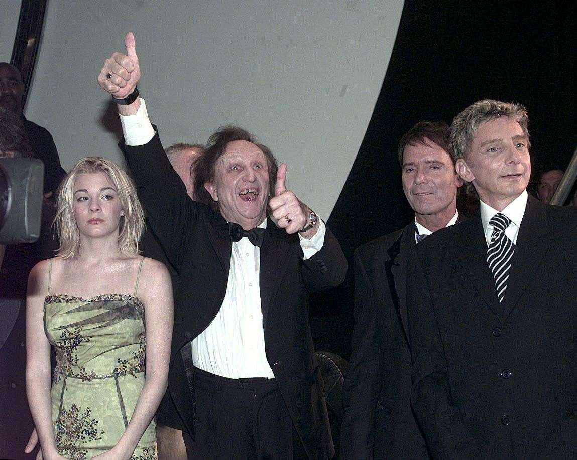 LeAnn Rimes, Ken Dodd, Sir Cliff Richard and Barry Manilow before they met the Queen backstage after the 1999 Royal Variety Performance at the Birmingham Hippodrome, in Birmingham (David Jones/PA)