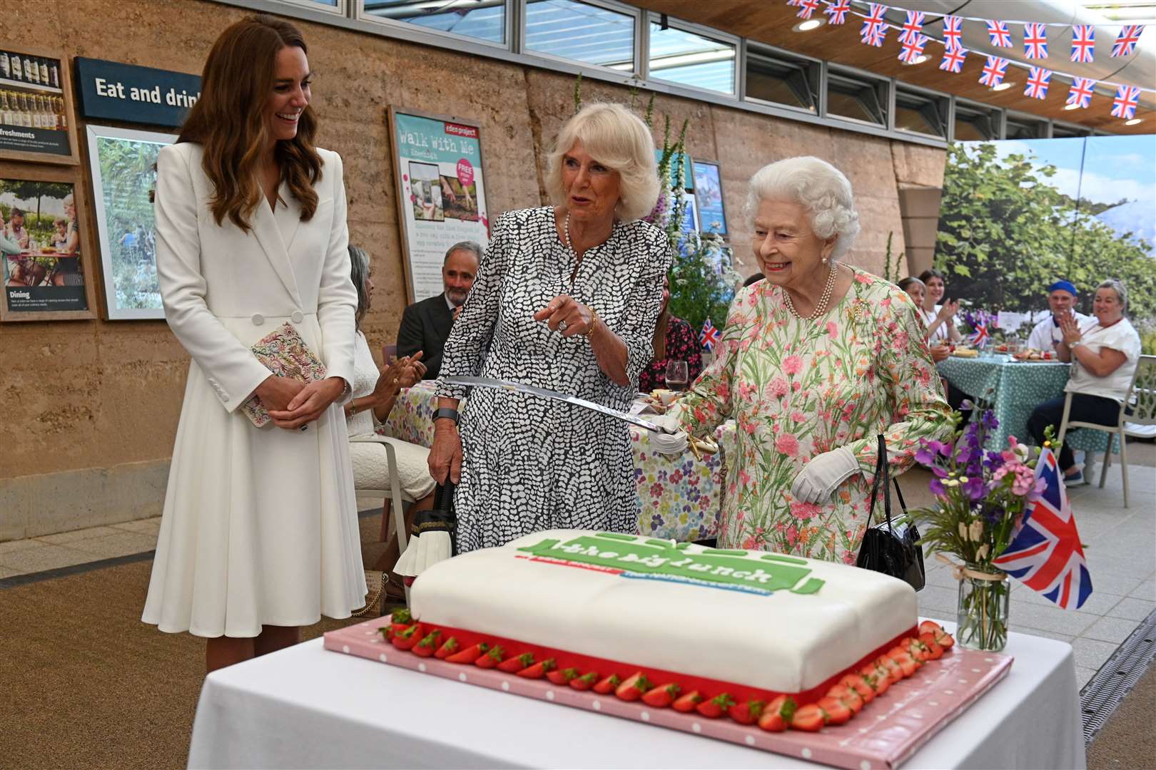 The late Queen with the then-Duchess of Cornwall and the then-Duchess of Cambridge, at the Eden Project (Oli Scarff/PA)