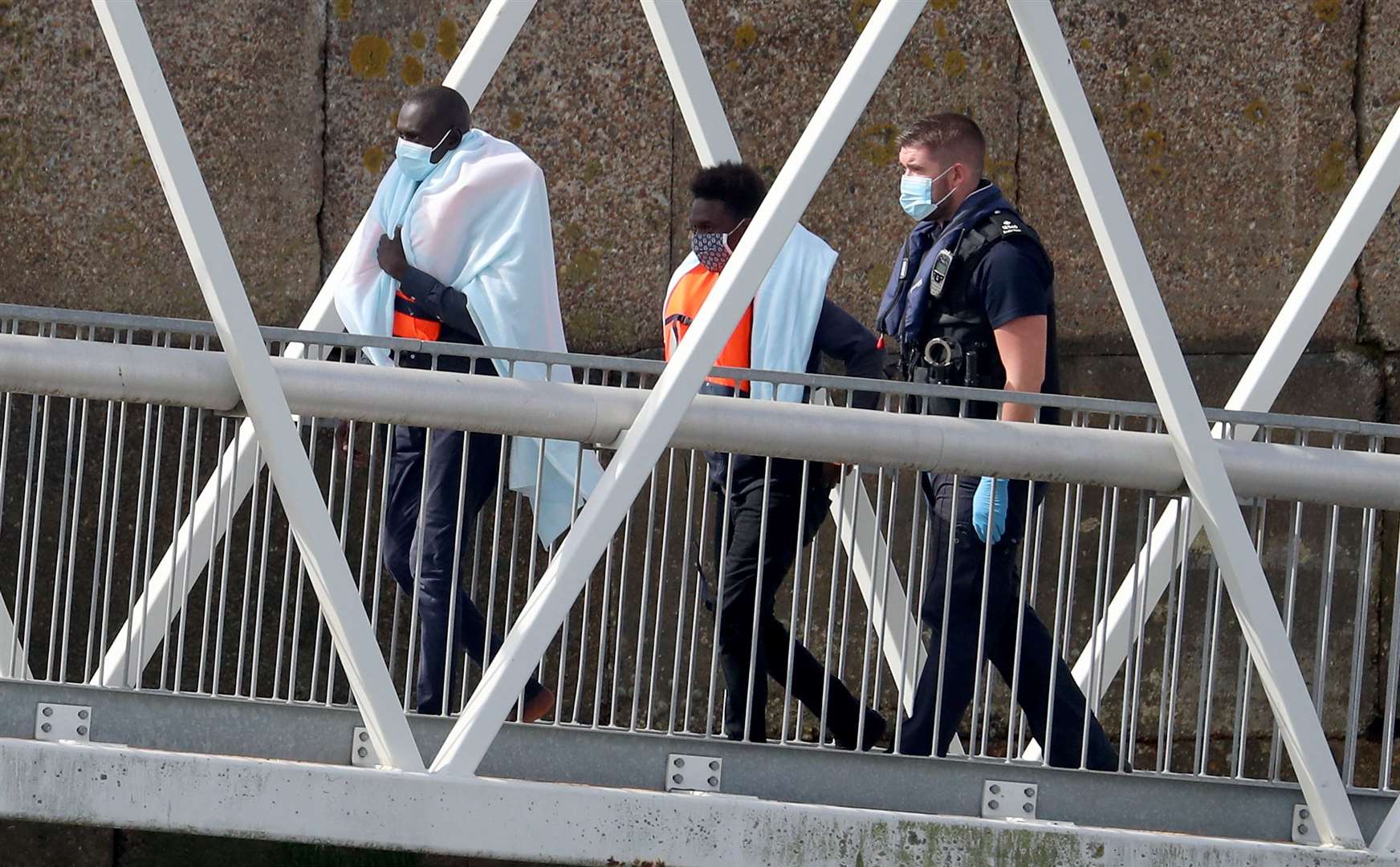 Two people thought to be migrants are brought into Dover (Gareth Fuller/PA)