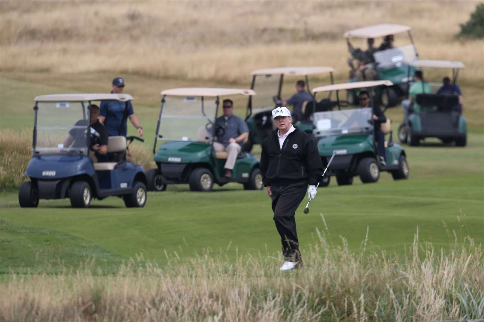 Donald Trump plays a round of golf on the Trump Turnberry resort in South Ayrshire (Jane Barlow/PA)