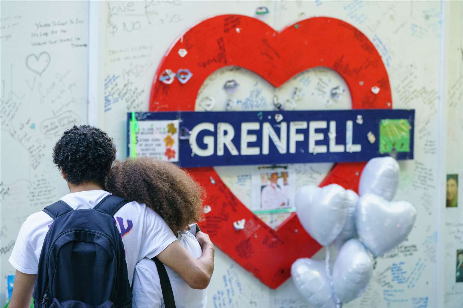 Mourners remember those who died in the Grenfell Tower fire (Dominic Lipinski/PA)