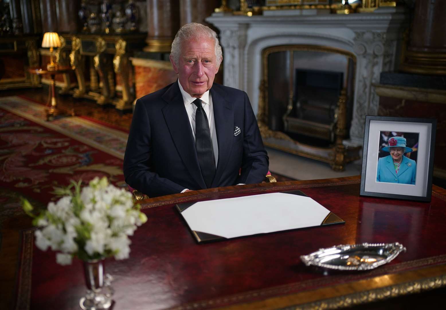 King Charles III delivers his address to the nation and the Commonwealth from Buckingham Palace (Yui Mok/PA)