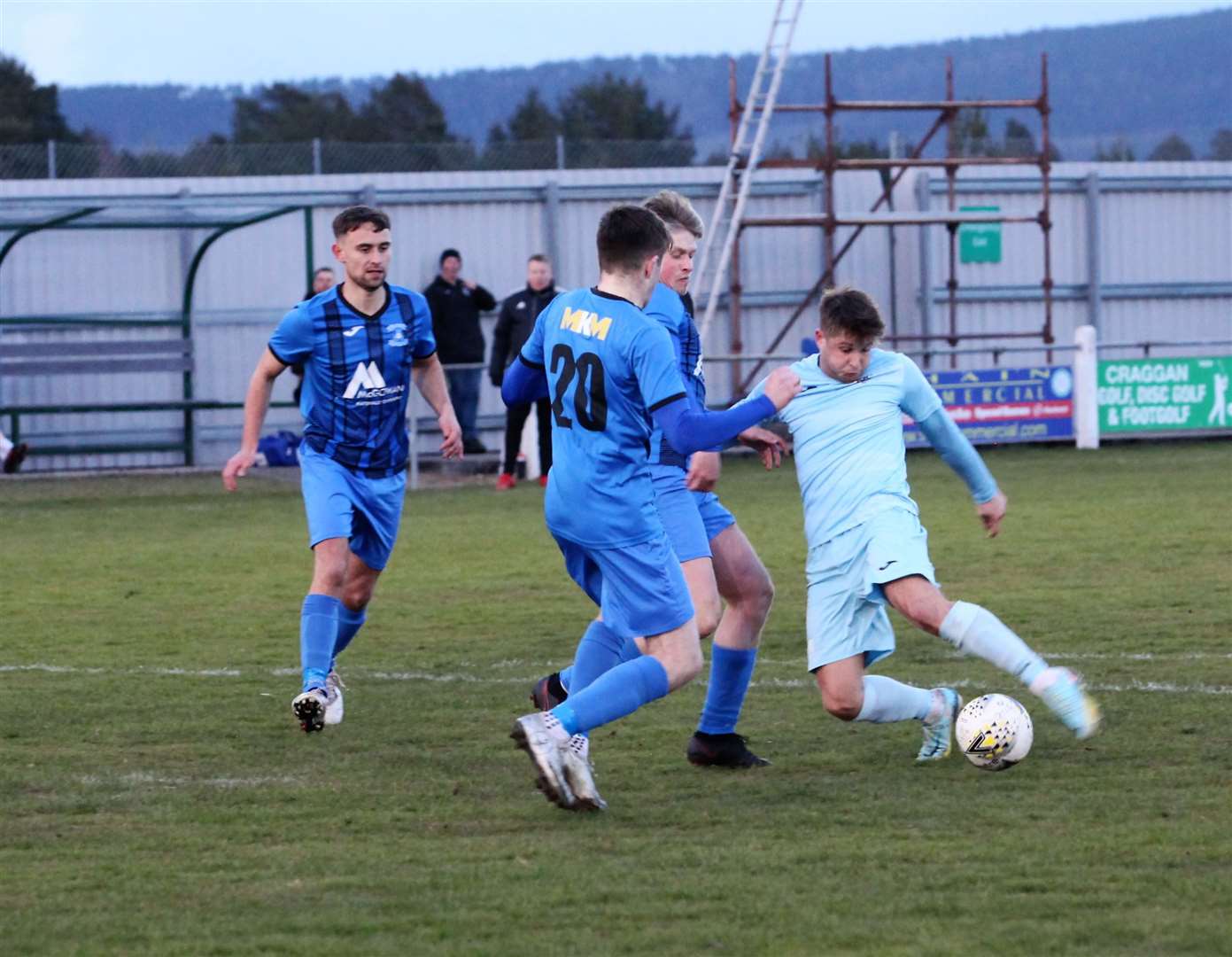 Liam Duncan gets a shot away under pressure from Owen Paterson and Joe Cuthbert. Picture: Frances Porter
