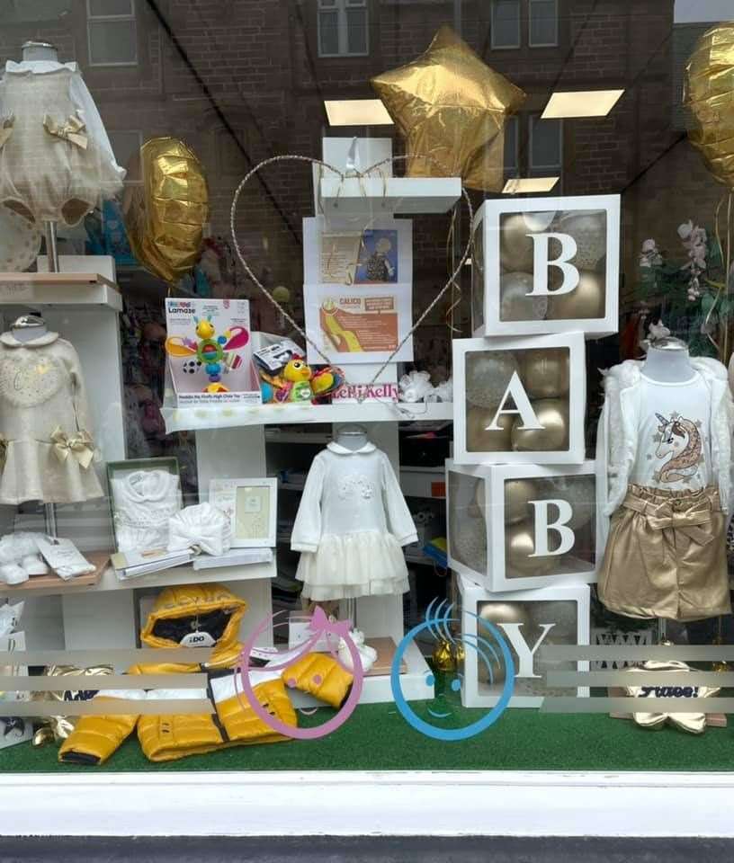 Many shop windows in Buckie were decked out in gold just like this one.