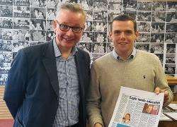 Read all about it! Michael Gove (left) and Douglas Ross get a sneak preview of the Advertiser story covering Councillor Tim Eagle's appointment as education committee chairman on Moray Council.