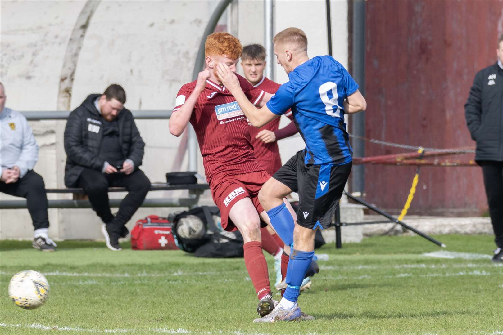 Huntly's Ryan Sewell and Keith's Matthew Tough clash after trying to get the ball. ..Keith F.C. v Huntly F.C. at Kynoch Park...Picture: Beth Taylor.
