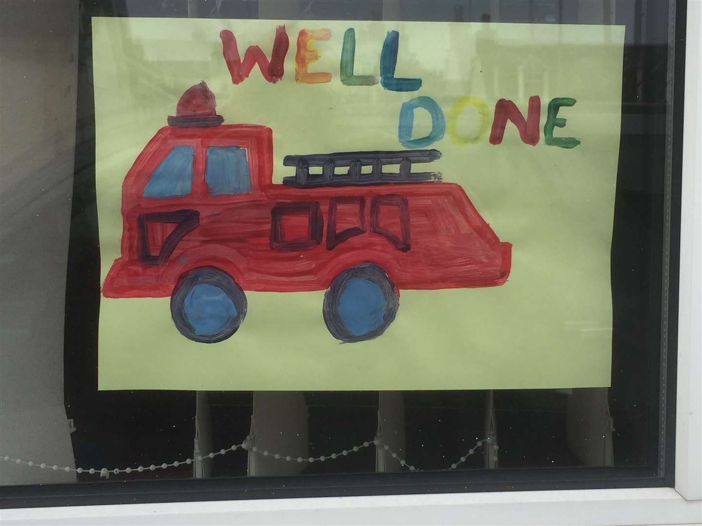 This message of appreciation from a local youngster is one of the drawings brightening up the fire station window.