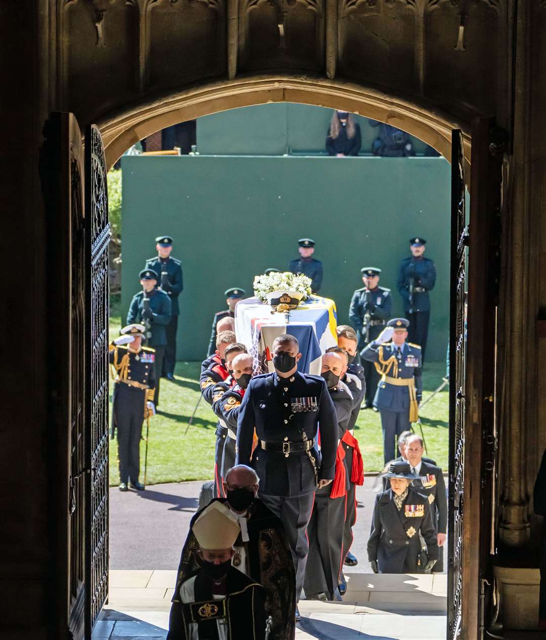 Pallbearers carry the coffin into the chapel (Danny Lawson/PA)