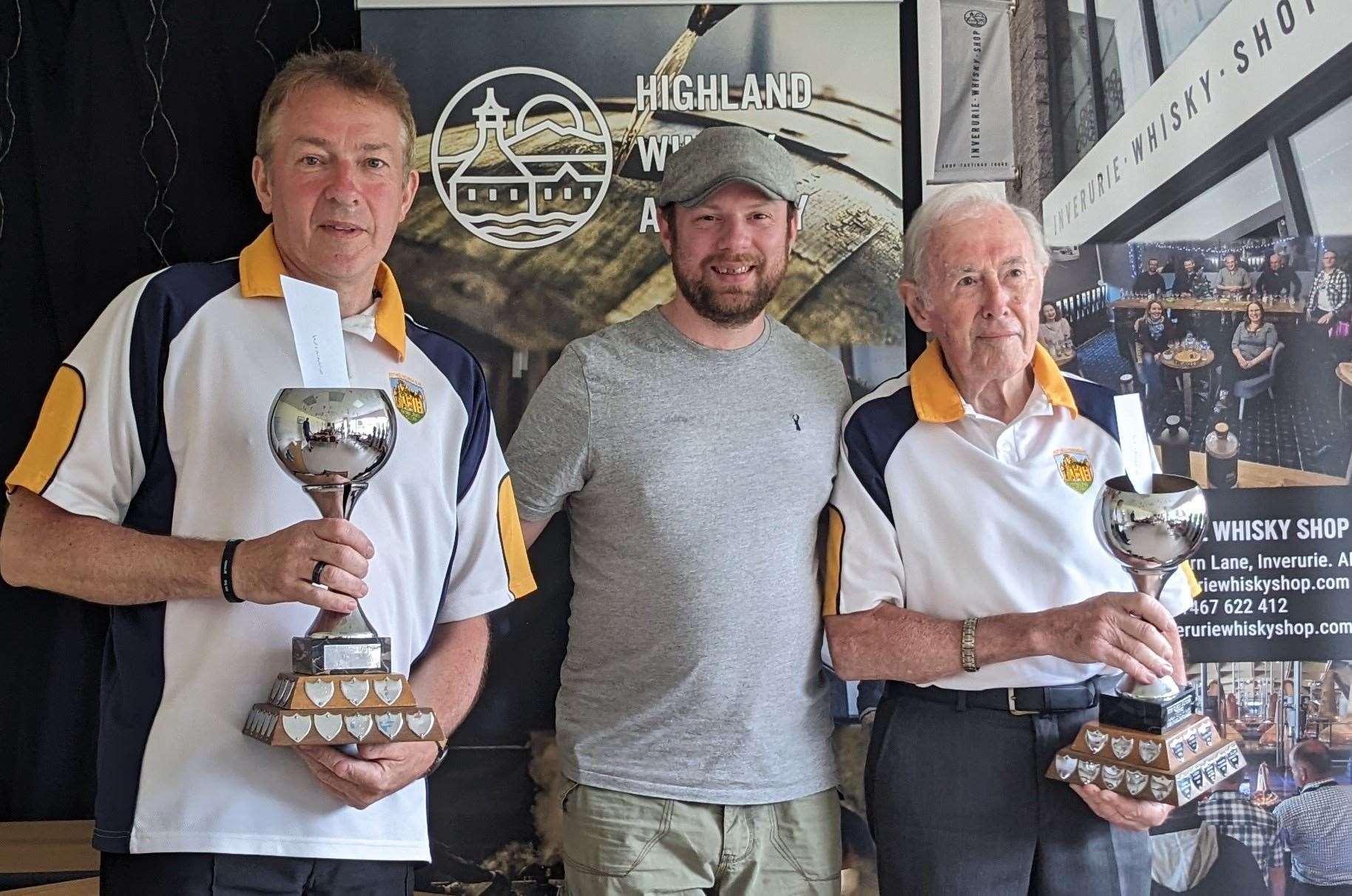 Mark Campbell and John Nicol of Rothienorman with sponsor Mike Stuart of Whisky Shop in Inverurie