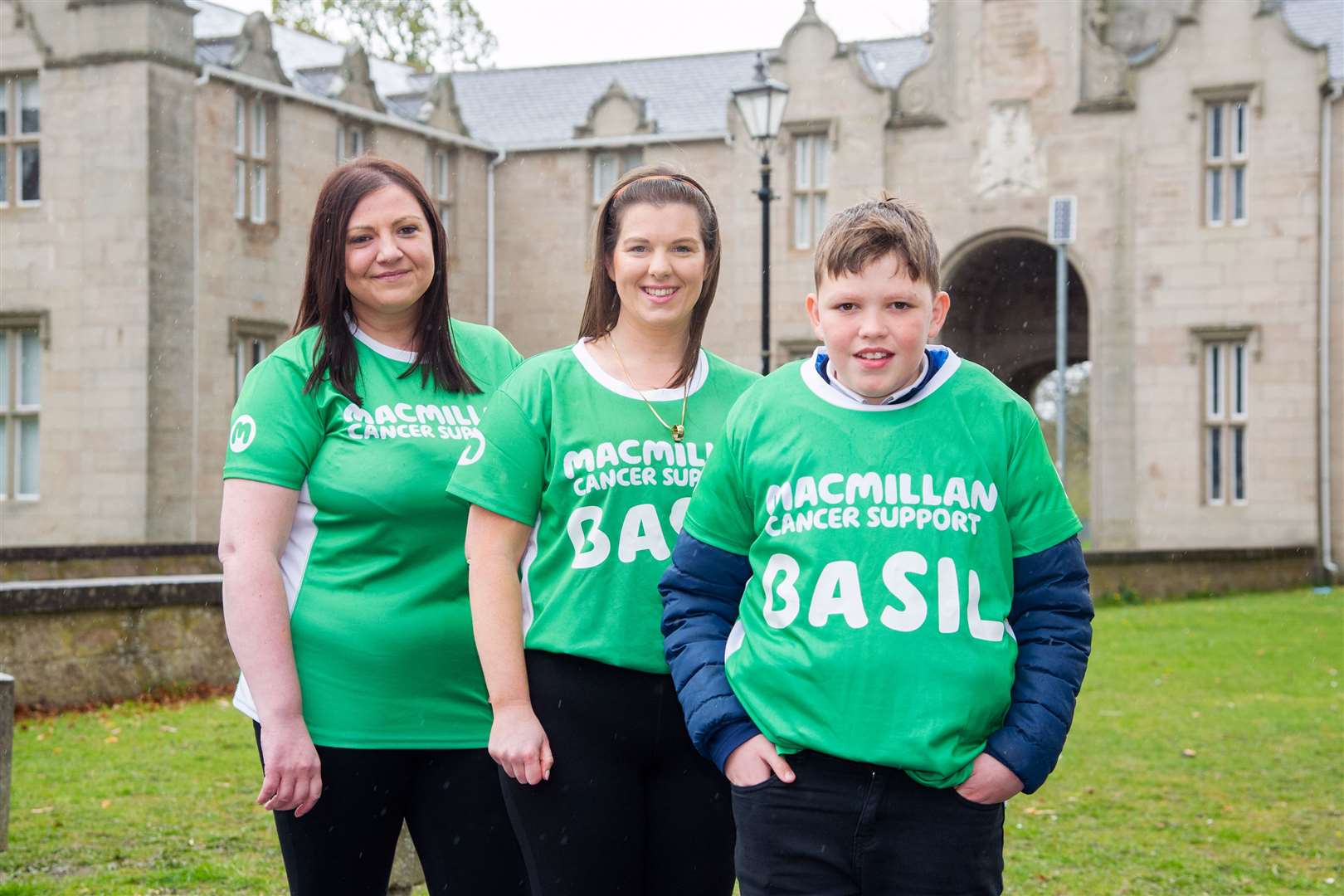 Claire Cameron, centre with her nephew Kai and friend Sarah McKinnon who raised £1600 for Macmillan Cancer Support by doing the Kiltwalk. Picture: Daniel Forsyth.