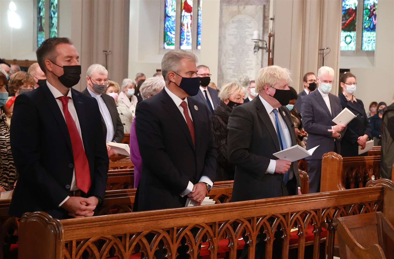 First Minister of Northern Ireland Paul Givan, Secretary of State for Northern Ireland Brandon Lewis and Prime Minister Boris Johnson attending a service to mark the centenary of Northern Ireland at St Patrick’s Cathedral in Armagh (Liam McBurney/PA)
