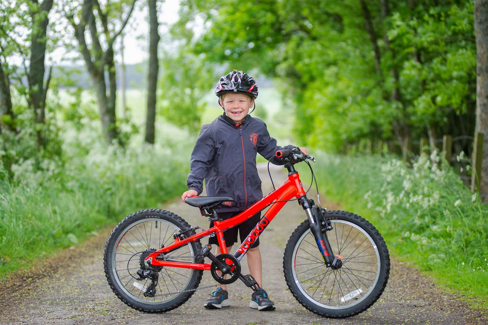 Six-year-old Lewis Mackay, from Keith, aims to cycle 100 miles throughout June for Breast Cancer Now. Picture: Daniel Forsyth.