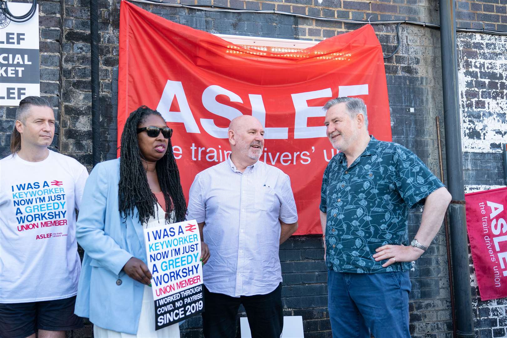 Aslef general secretary Mick Whelan (centre) speaks with Labour MPs Dawn Butler and Barry Gardiner at a picket line (PA)
