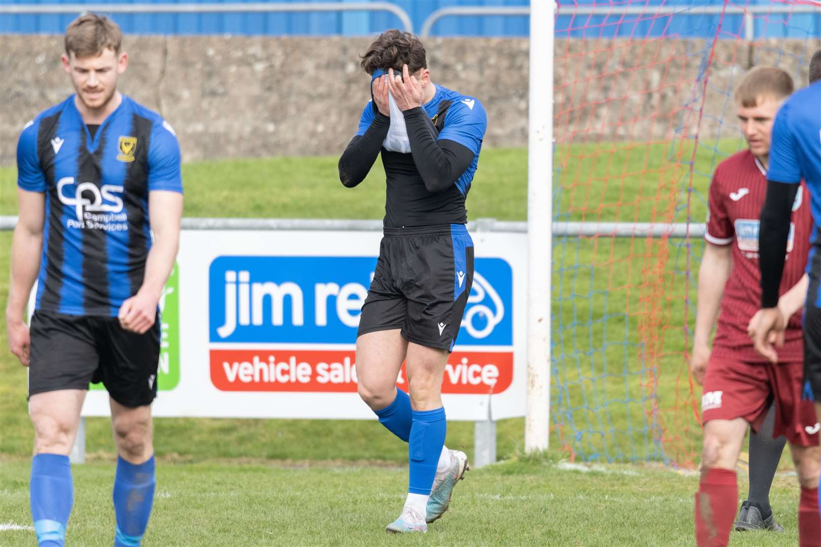 Huntly's Brodie Allen shows how he feels after missing an opportunity to take the lead. ..Keith F.C. v Huntly F.C. at Kynoch Park...Picture: Beth Taylor.