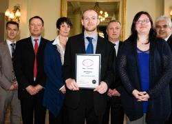 The winning Robertson team. Business Development Director Raymond More stands far right