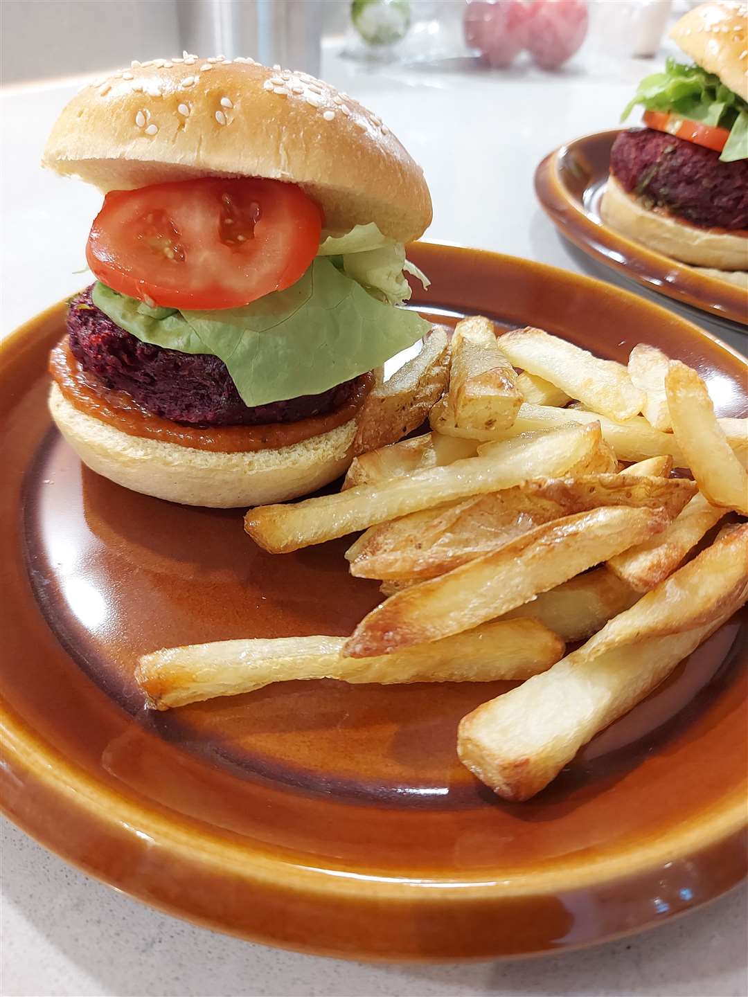 Beetroot burger and chips.