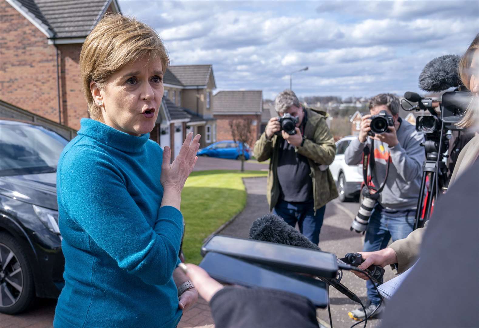 Nicola Sturgeon speaks to the media outside her home in Uddingston, Glasgow (Jane Barlow/PA)